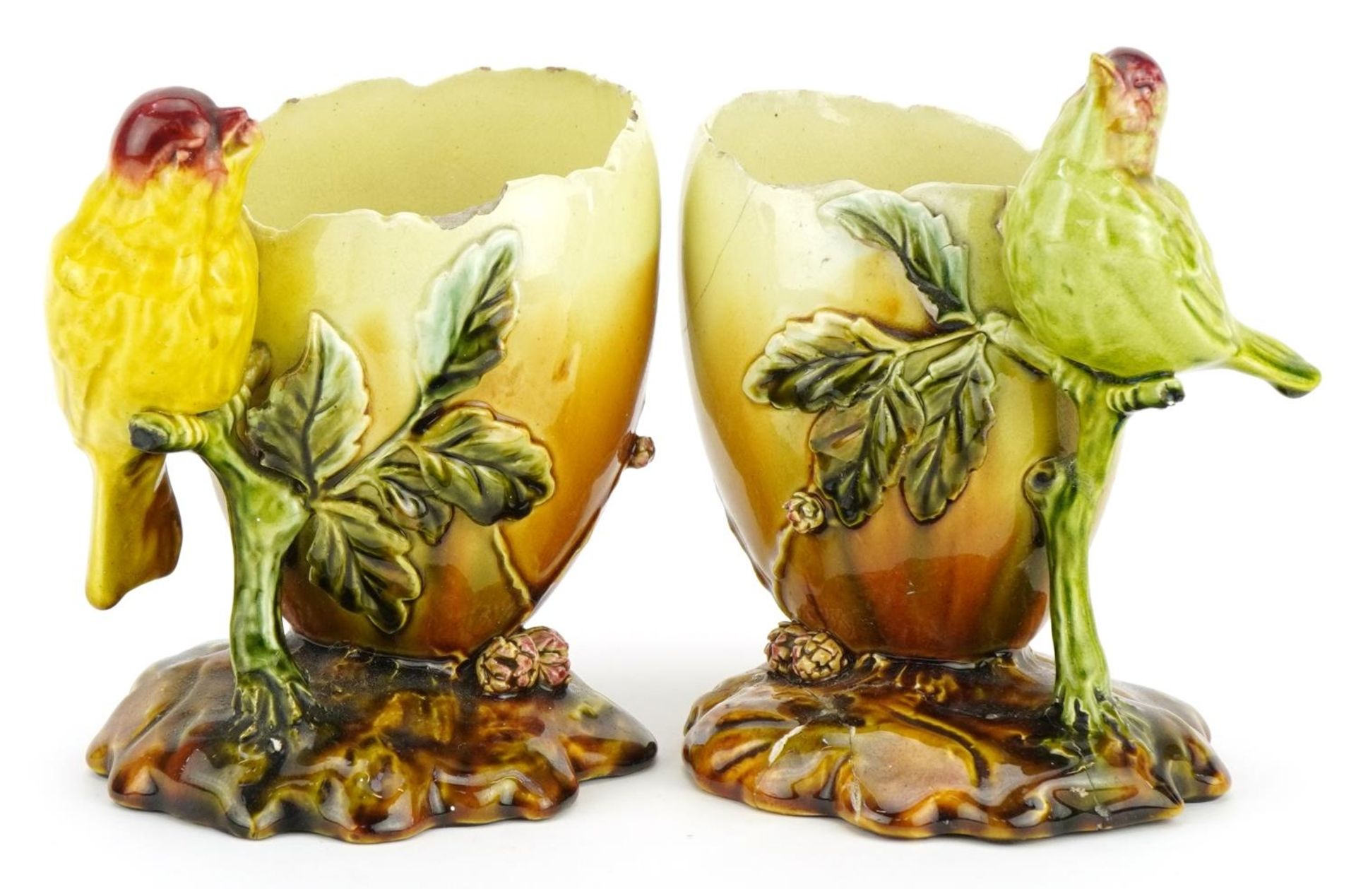 Bretby, pair of Art Nouveau vases, each in the form of a bird with an egg, one numbered 1184, each