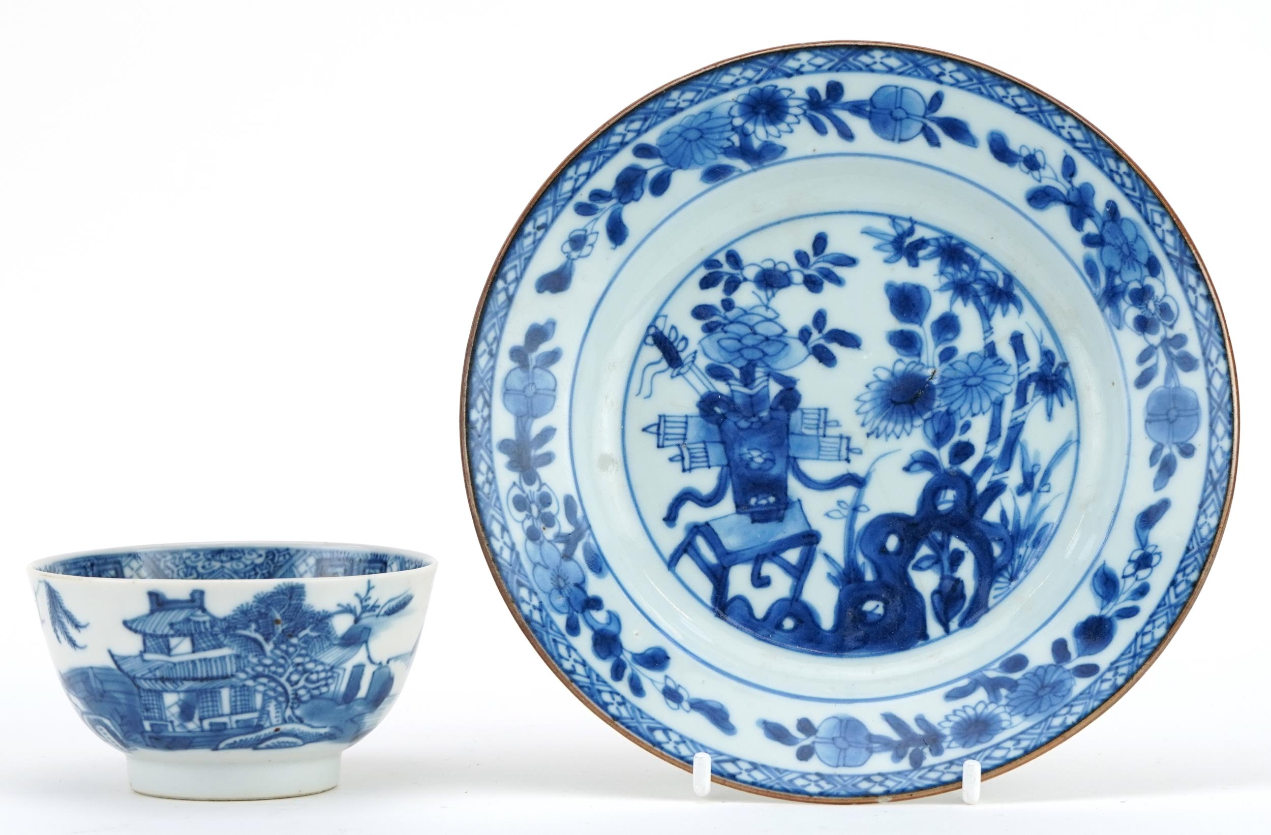 Chinese blue and white porcelain plate and tea bowl hand painted with a river landscape, the largest