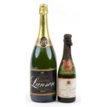 Two bottles of vintage and later Champagne comprising half bottle of 1921 Louise Rodier Extra Dry