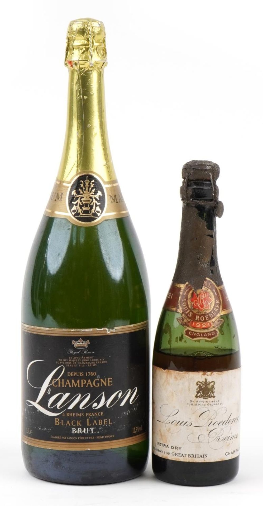 Two bottles of vintage and later Champagne comprising half bottle of 1921 Louise Rodier Extra Dry