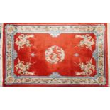 Large Chinese red ground rug with allover floral and dragon design, 290cm x 185cm : For further
