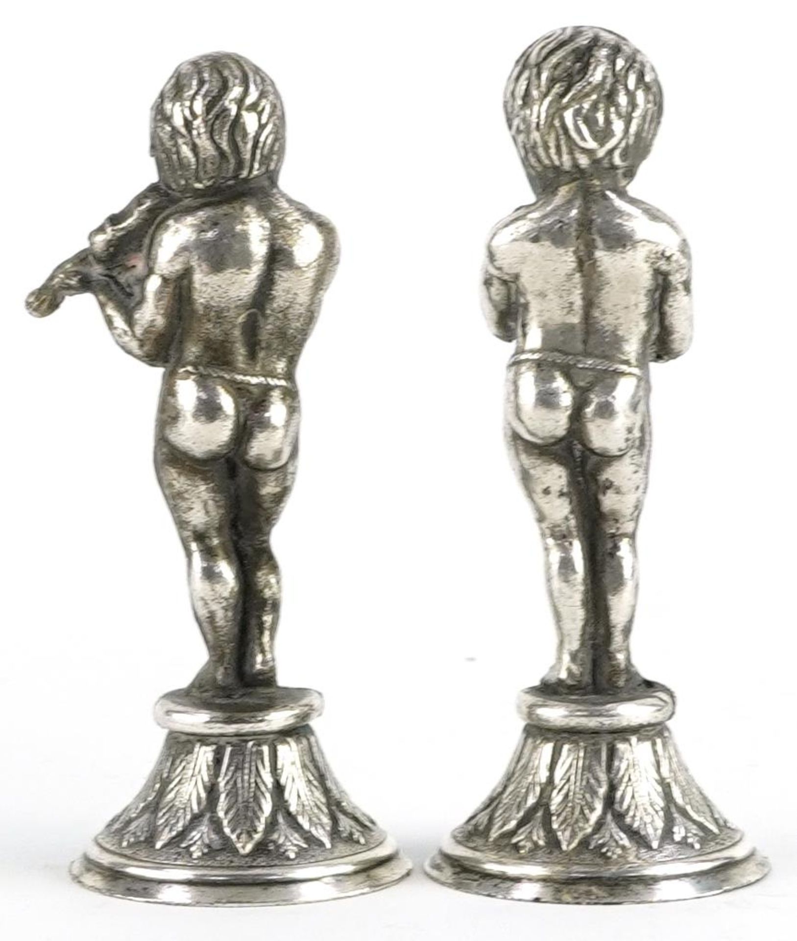 Two continental white metal figures of semi nude male musicians, each 8.5cm high : For further - Image 2 of 3