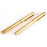 Two Dunhill gold plated fountain pens with 14ct gold nibs : For further information on this lot