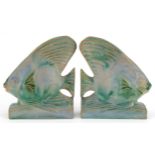 Pair of Bourne Denby Danesby Ware bookends in the form of stylised fish, each 16.5cm high : For