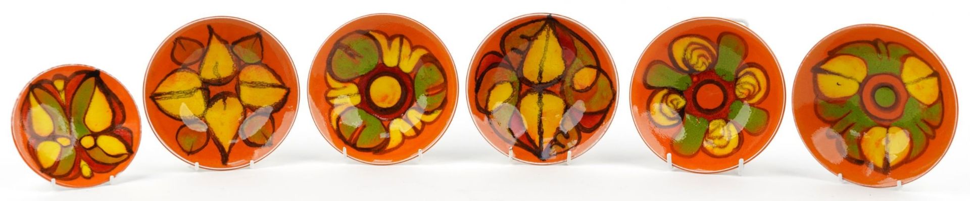 Five Poole Pottery Delphis bowls and a dish, the largest 16cm in diameter : For further