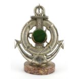 Shipping interest cast metal lifebuoy and anchor pocket watch stand with circular marble base,
