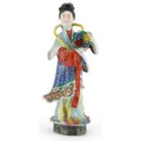 Chinese porcelain statuette of an empress holding flowers hand painted in the famille rose