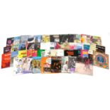Vinyl LP records including Genesis, Motorhead, Michael Jackson, Deep Purple, Kiss and Phantom of the