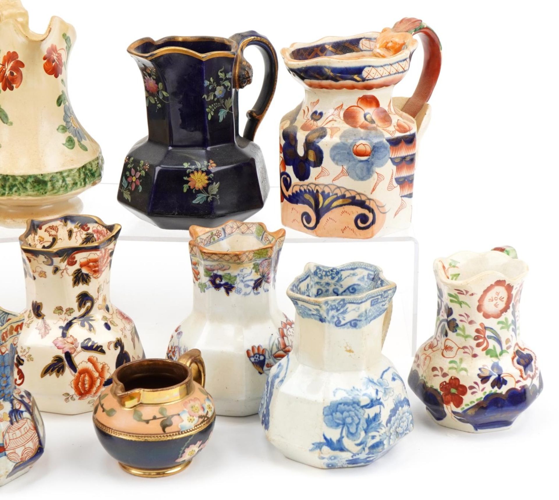 Early 19th century and later jugs including an example hand painted with flowers, cobalt blue glazed - Image 3 of 5