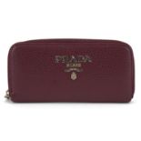 Ladies Prada burgundy leather purse : For further information on this lot please visit