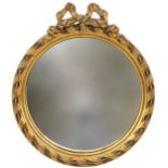 Circular gilt framed convex wall mirror with bow crest, 33cm high : For further information on