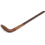 T Morris, early 19th century scared head Sunday golf club walking stick, 94cm in length : For