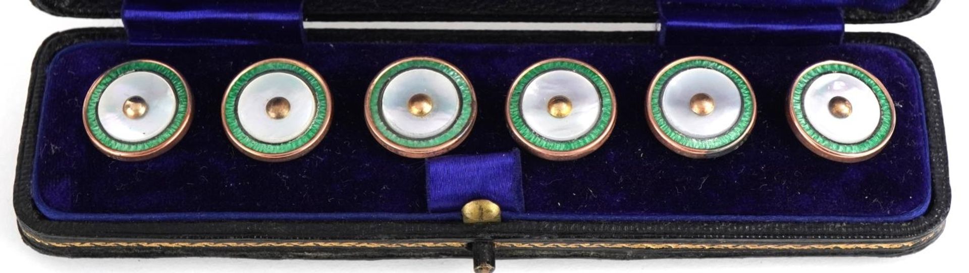 Set of six 9ct gold mounted mother of pearl and green enamel studs housed in a fitted silk and - Image 2 of 4