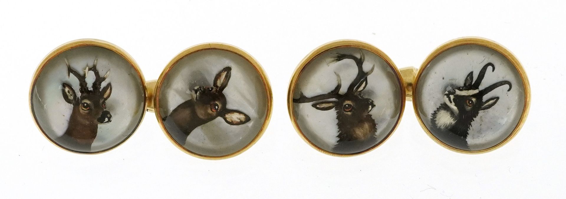 Pair of 14ct gold Essex Crystal deer cufflinks housed in a fitted velvet box, 1.4cm in diameter,