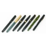Seven vintage fountain pens, five with gold nibs including green marbleised Summitt, Parker, Swan