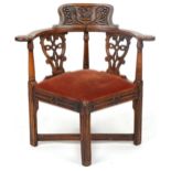 19th century country style corner chair carved with lion crest and flowers, 80cm high : For