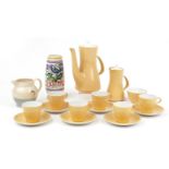 Poole pottery including six place yellow ground tea service and a vase hand painted in the L E