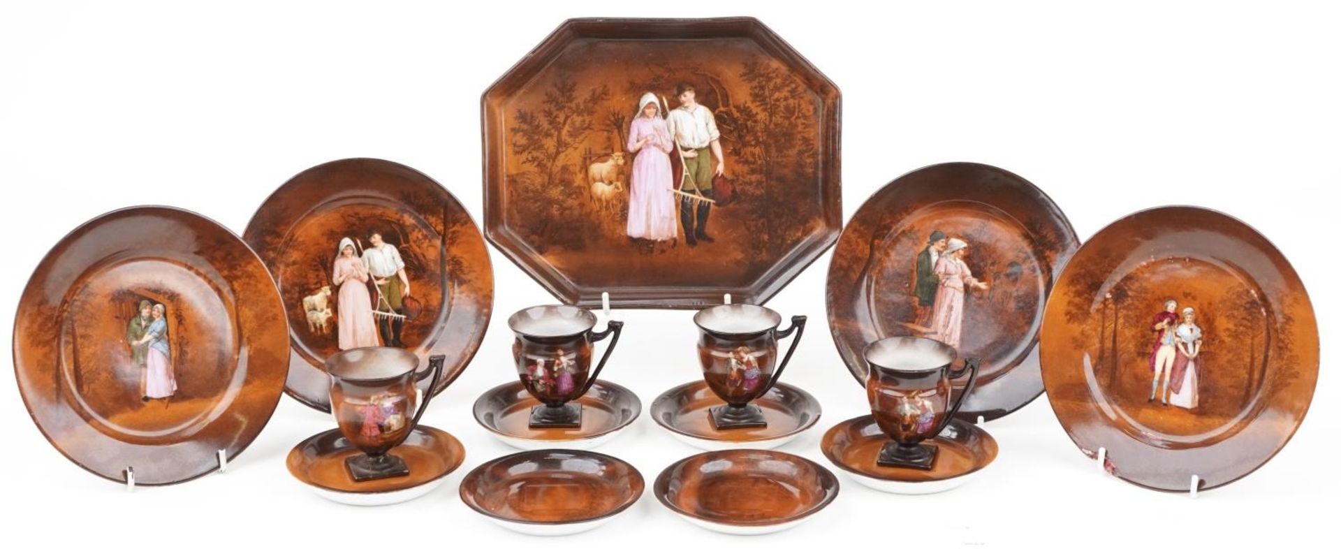 German Sylvia porcelain teaware including various plates and cups decorated with figures, the