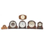 Six mantle clocks including an Art Deco Smith Enfield housed in a brown Bakelite case and four oak
