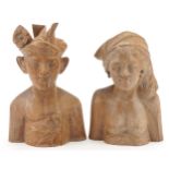 Two Balinese carved wood busts, the largest 24cm high : For further information on this lot please