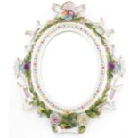 19th century German floral encrusted porcelain wall mirror in the style of Meissen, 32.5cm x