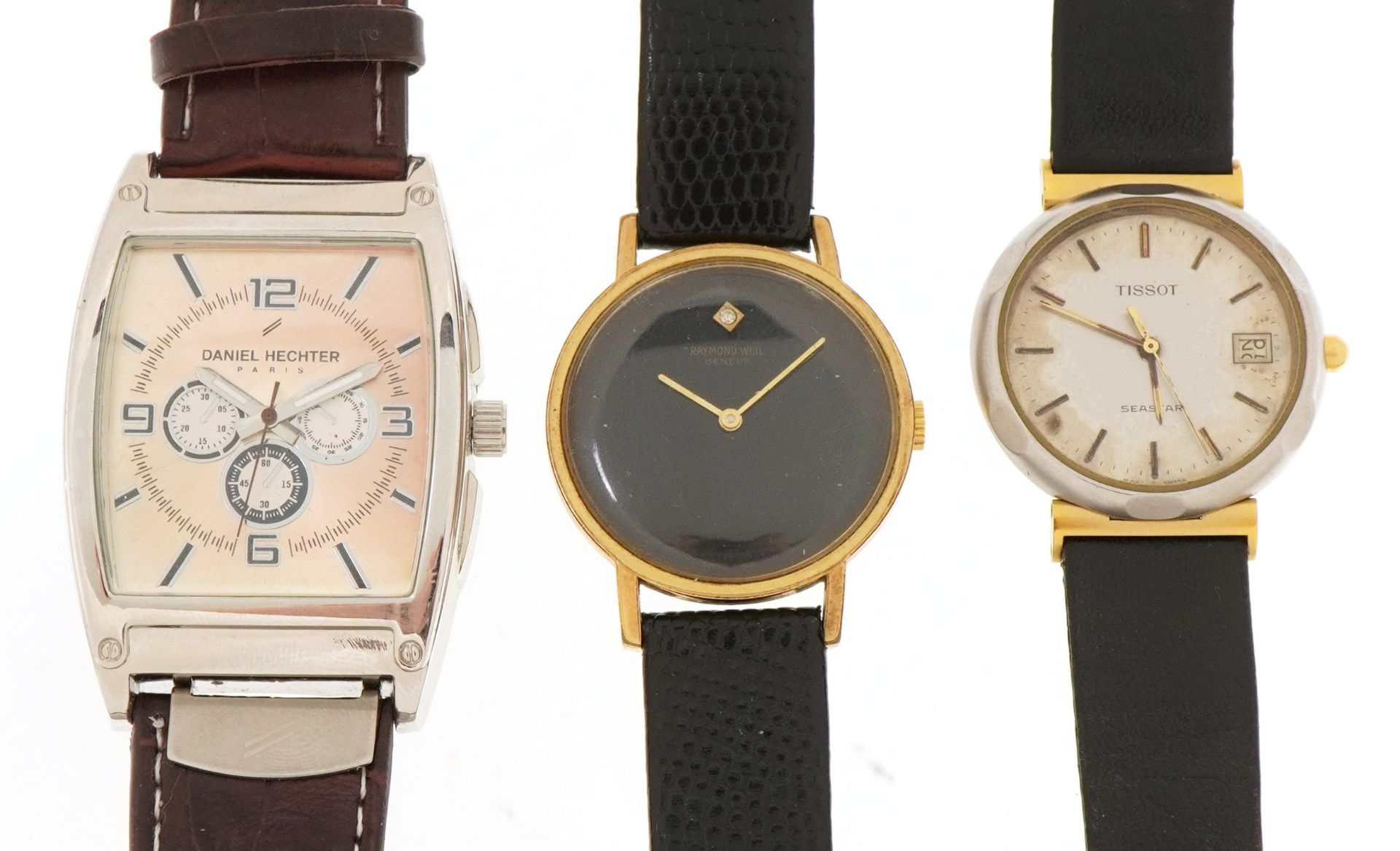 Three vintage and later gentlemen's wristwatches comprising Tissot Seastar with box, Raymond Weil