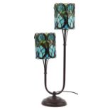 Bronzed Tiffany design two branch table lamp with leaded stained glass shades, 75cm high : For