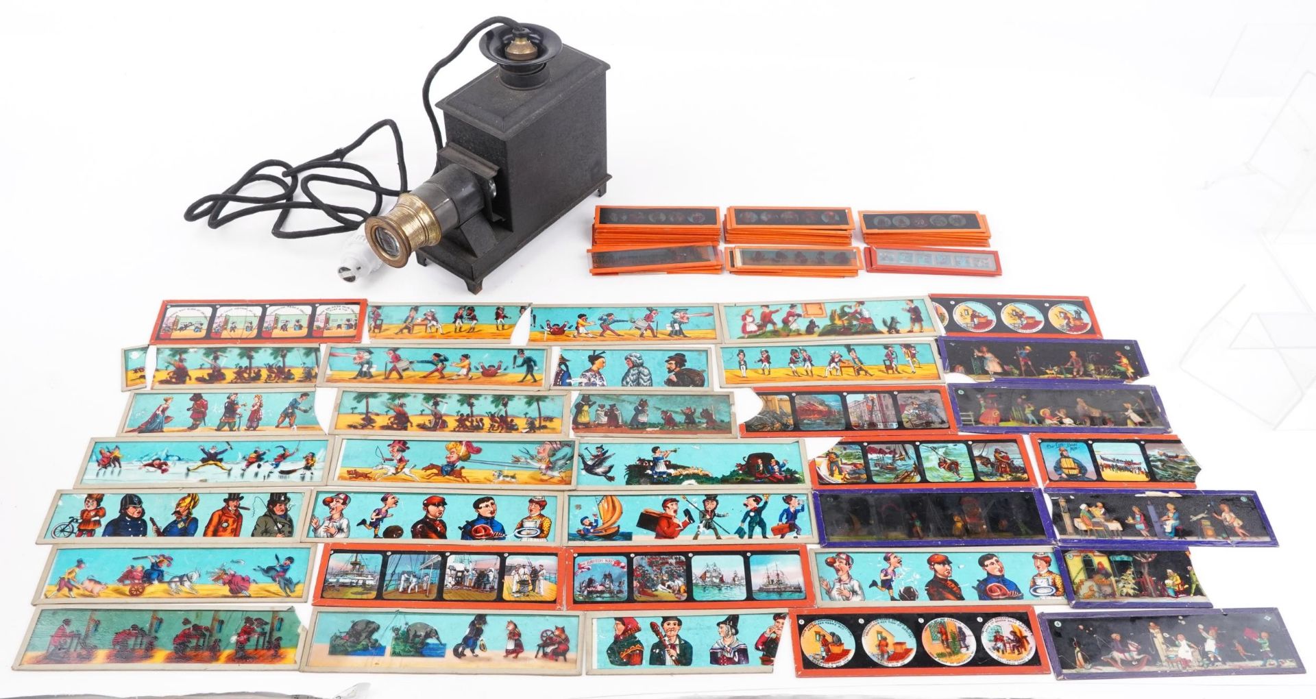 Vintage magic lantern with a collection of coloured magic lantern slides, some with boxes : For