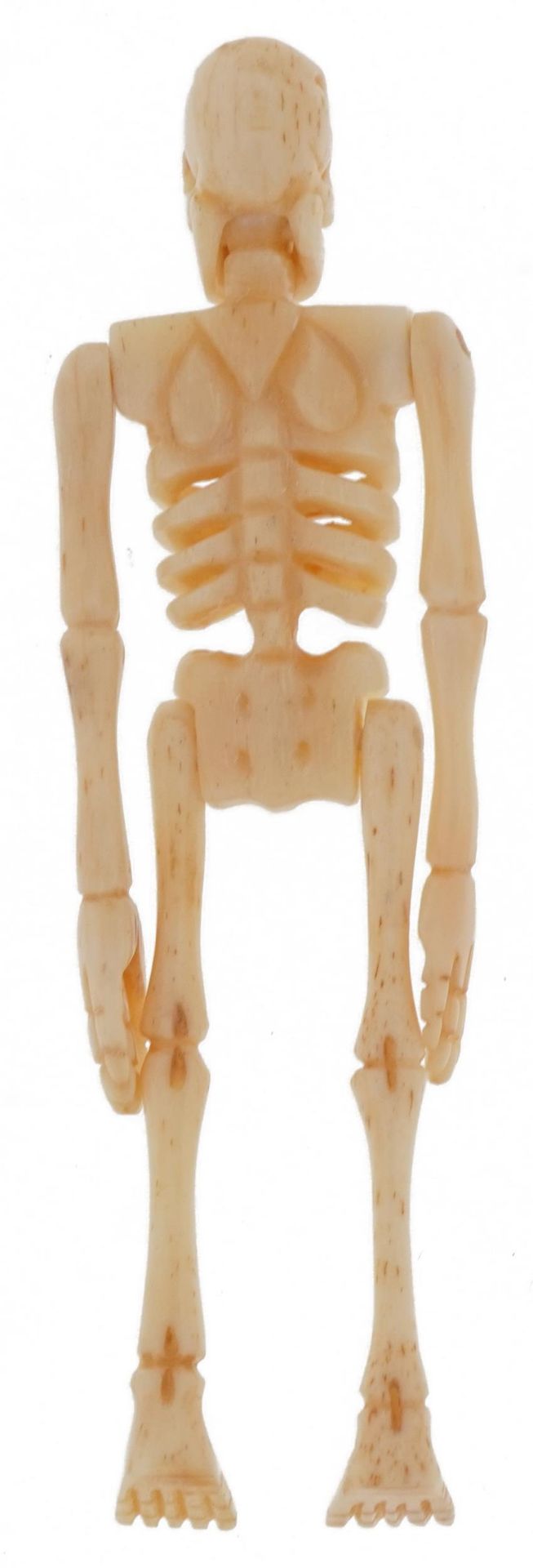 Novelty carved bone articulated skeleton housed in a sectional bone coffin, the largest 11.5cm in - Image 4 of 6