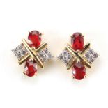 Pair of 9ct red and clear stone stud earrings, 1cm high, 2.5g : For further information on this