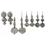 Four pairs of Indian unmarked silver and white metal earrings including filigree and pierced