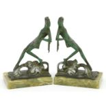 Bruno Zach, pair of Austrian Art Deco verdigris bronze and onyx bookends in the form of scantily