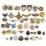 Collection of predominantly military interest pin badges and buttons including British Legion