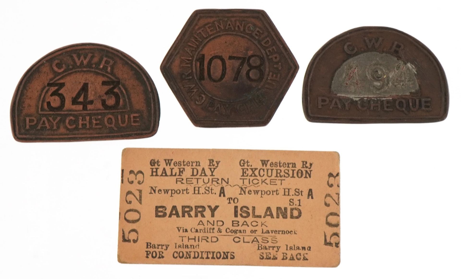 Three Great Western railway metal pay cheques and a return ticket to Barry Island : For further