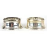 Mappin & Webb, pair of Elizabeth II circular silver open salts with clear glass liners, London 1937,