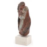 Mid century style terracotta theatrical mask raised on a block stand inscribed Mapmap, the bust with