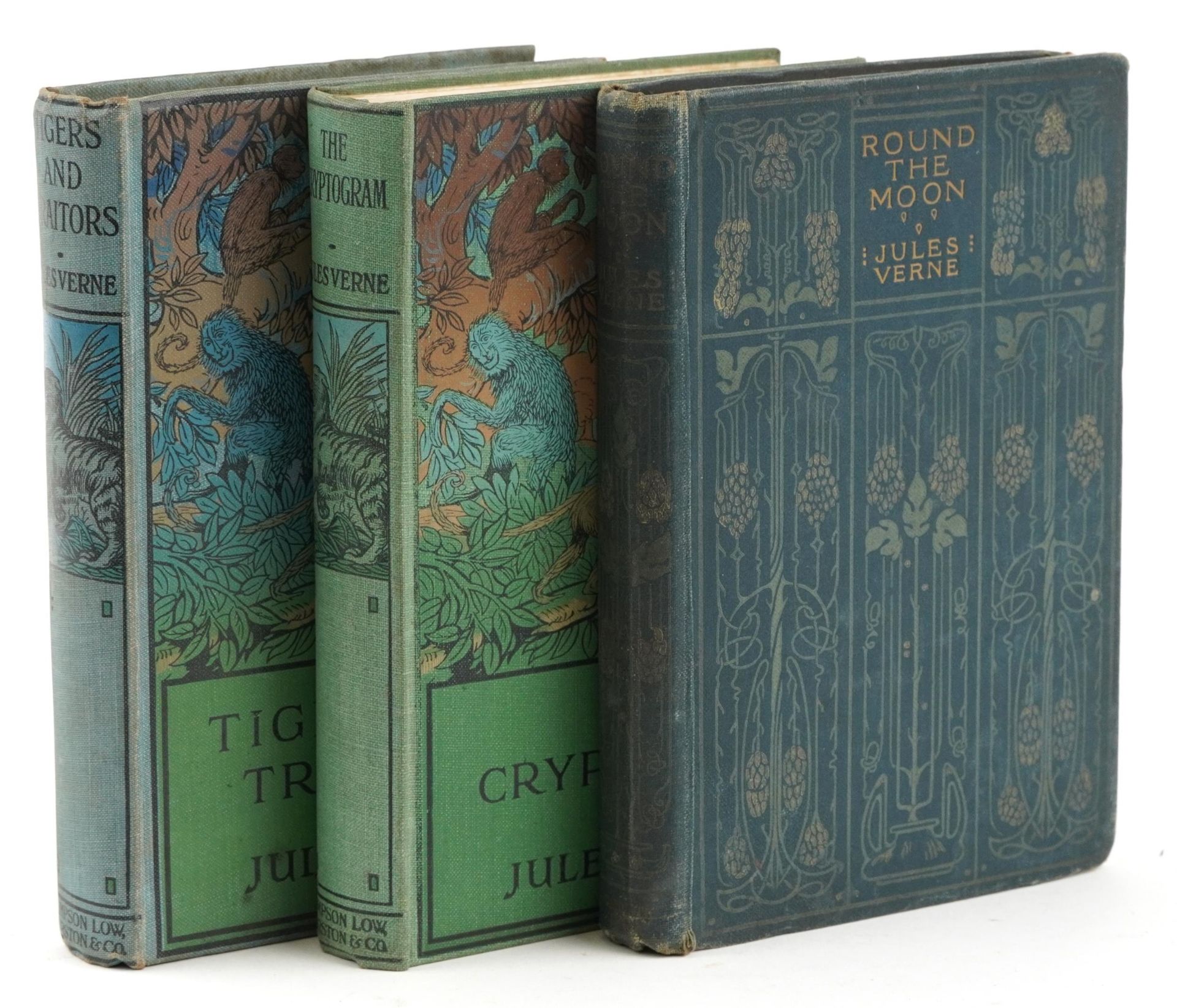 Three Jules Verne hardback books comprising Round the Moon, The Cryptogram and Tiger's &