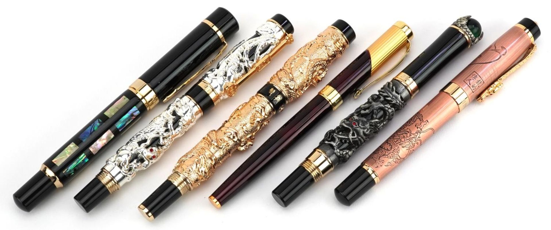 Six Chinese Jinhao fountain pens including three dragon examples : For further information on this