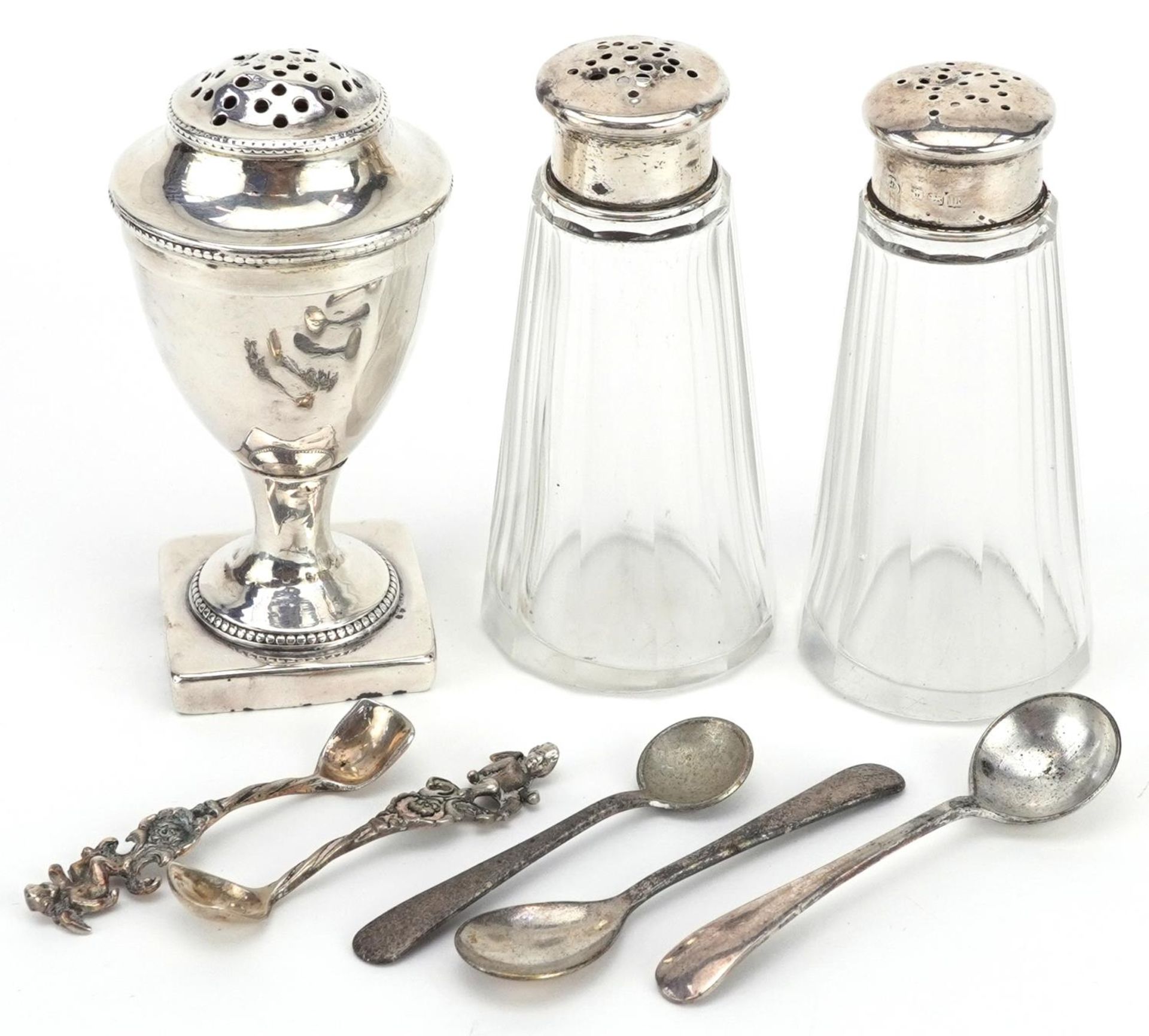 Georgian and later silver and white metal objects including a George III silver caster London 1787