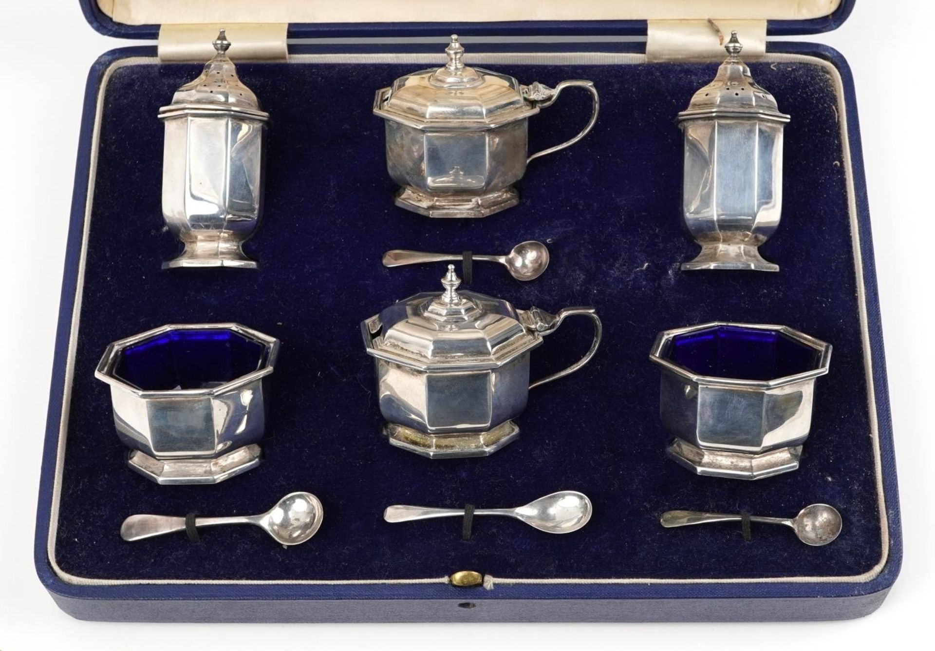 Mappin & Webb, Art Deco octagonal silver six piece cruet with blue glass liners housed in a Mappin & - Image 2 of 5