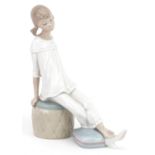 Lladro figurine of a Girl with Mother's shoe, 1084, 18.5cm high : For further information on this