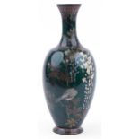 Large Japanese green ground cloisonne vase enamelled with a bird amongst wisteria, 44cm high : For