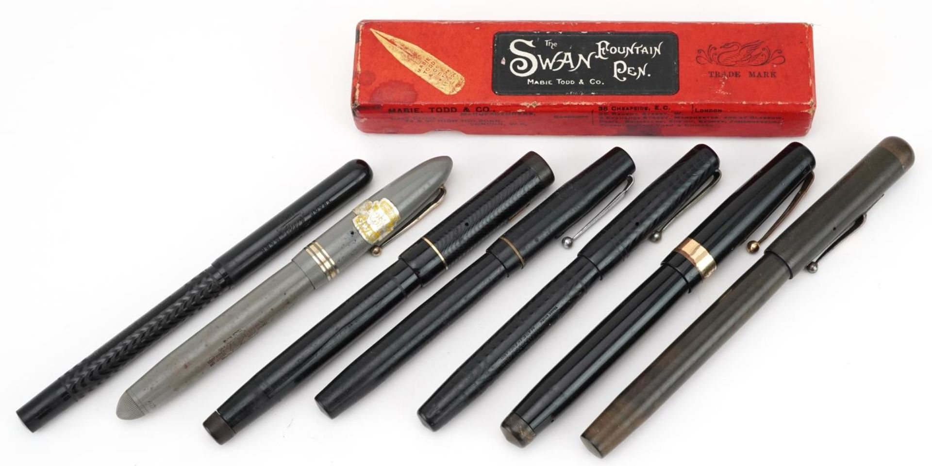 Seven vintage Swan self-filler or Leverless fountain pens, five with gold nibs, one with box : For