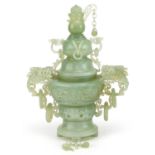 Chinese green jadeite lidded censer with ring turned handles carved with mythical animals, 29cm high