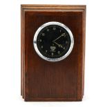 Vintage Smiths car clock with luminous hands housed in an oak case, overall 21cm H x 15cm W x 7cm