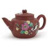 Chinese Yixing terracotta teapot enamelled with a bird amongst flowers, character marks to the base,