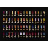 Decorative military interest mahogany framed display of British campaign and gallantry medals,