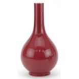 Chinese porcelain vase having a sang de boeuf glaze, six figure character marks to the base, 23cm