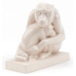 John Skeaping for Wedgwood, Art Deco cream glazed pottery sculpture of two monkeys, 18cm wide :