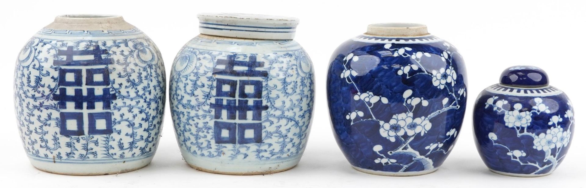 Four Chinese blue and white porcelain ginger jars including two hand painted in the prunus